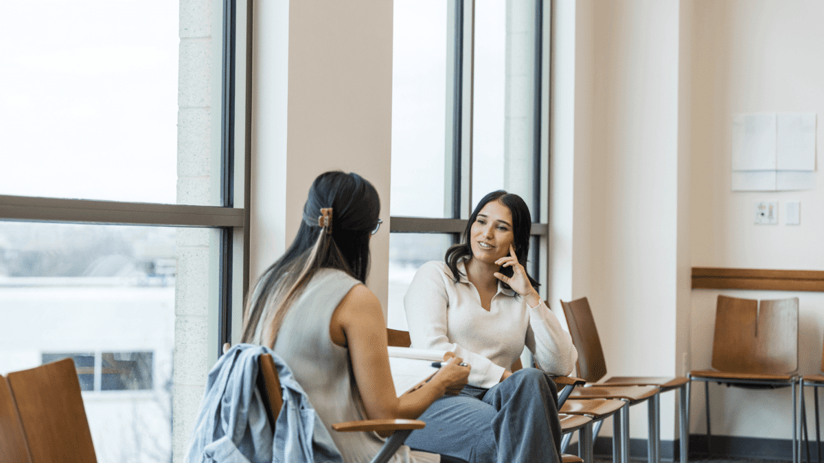 placeholder image of two person having a conversation and actively listening