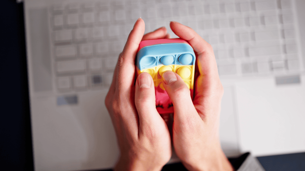 placeholder image of managing emotions with stress-relieving toy